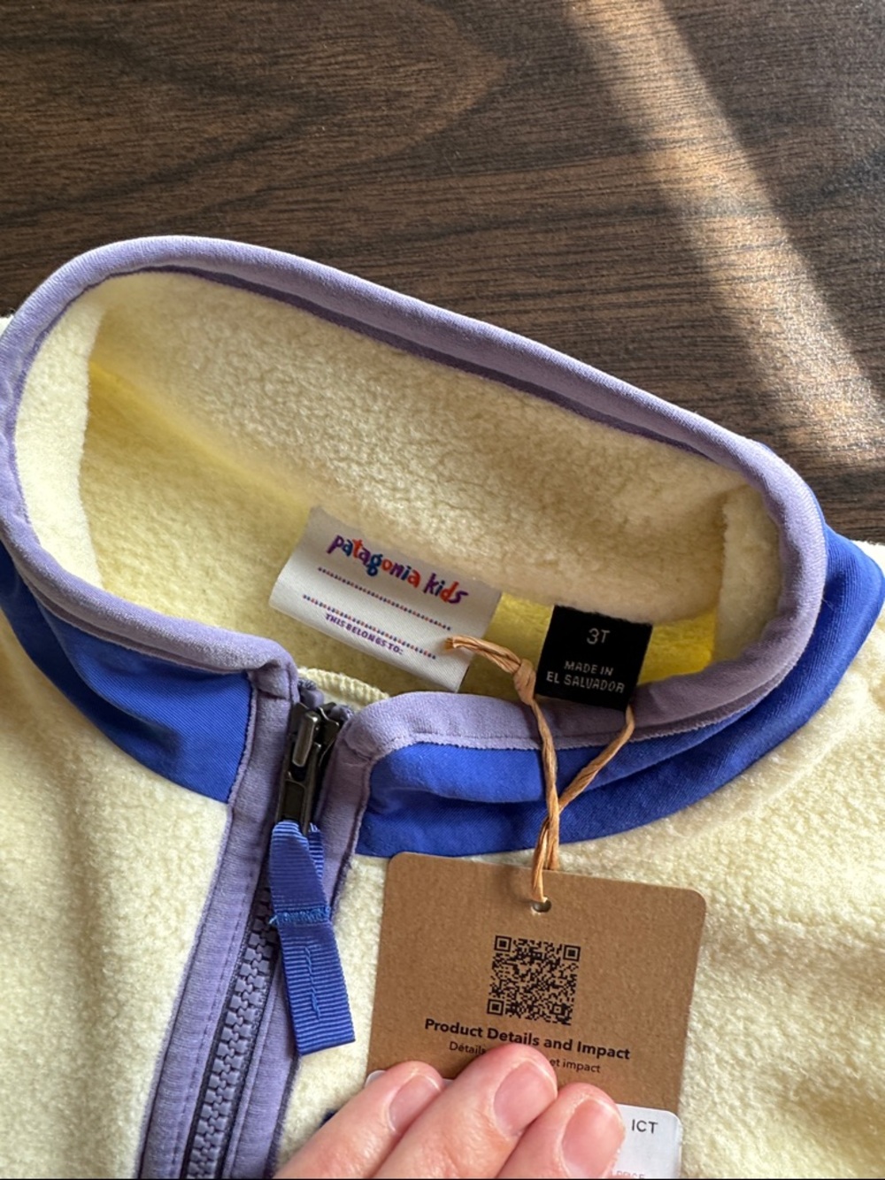 Patagonia Kids Cream Fleece Vest with Blue Pocket and Lavender Trim - Picture 2 of 4
